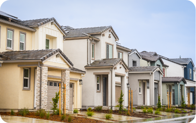 A row of newly built suburban investment homes