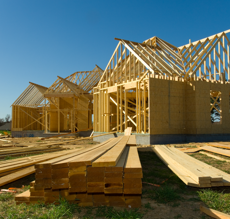 Roof trusses stacked on a new build site